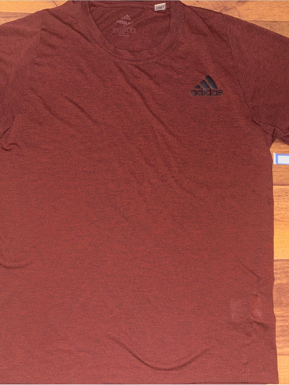 Adidas FreeLift Short Sleeve Athletic Shirt
Color: Heathered Rust / Dark Red